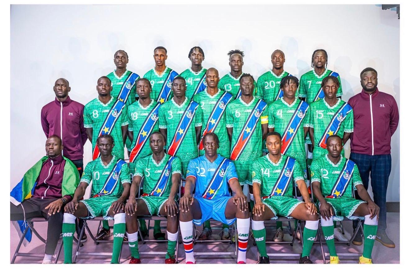 Aguer with the South Sudan community football team in Victoria